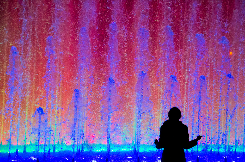Colorful illuminated fountains at Parque de la Reserva